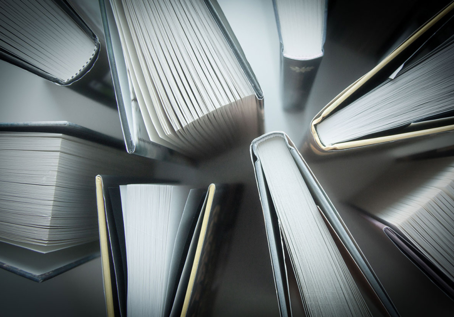 Upright books photographed from above.